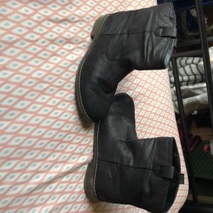 *Black Boots With a Thick Heel